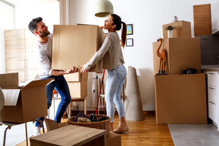 A couple moving into their new home