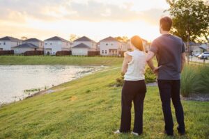 A couple watching a sunset in a HomeSite Residential Community